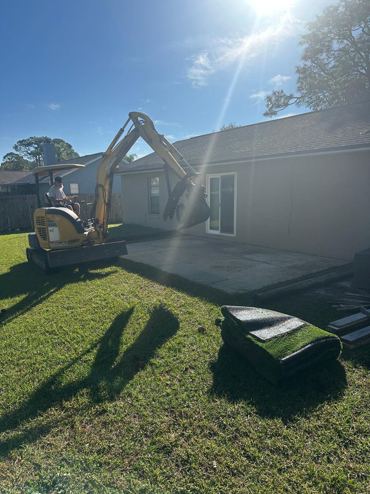 Crew beginning porch demolition work for a residential project in Brevard County