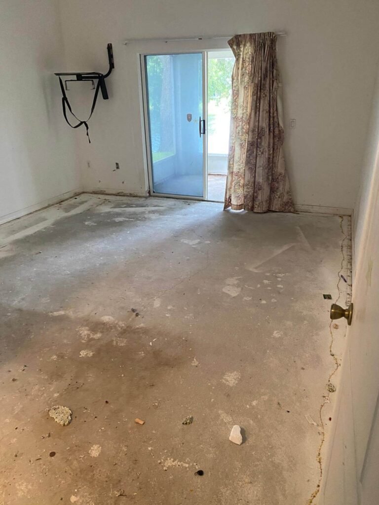 Bedroom fully cleared during hoarder home junk removal in Rockledge, FL