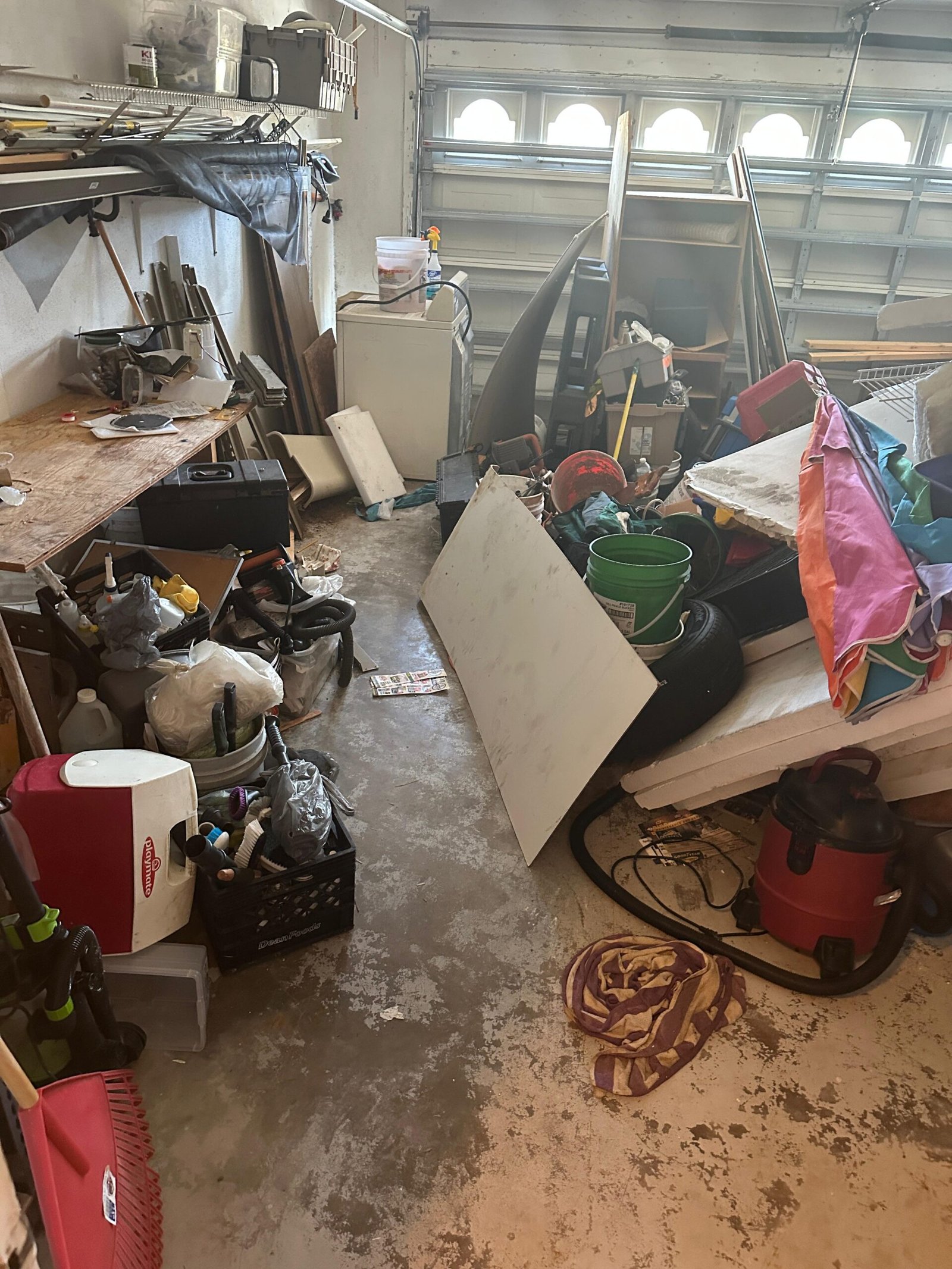 cluttered garage junk removal Melbourne FL — Dumpster Wiz