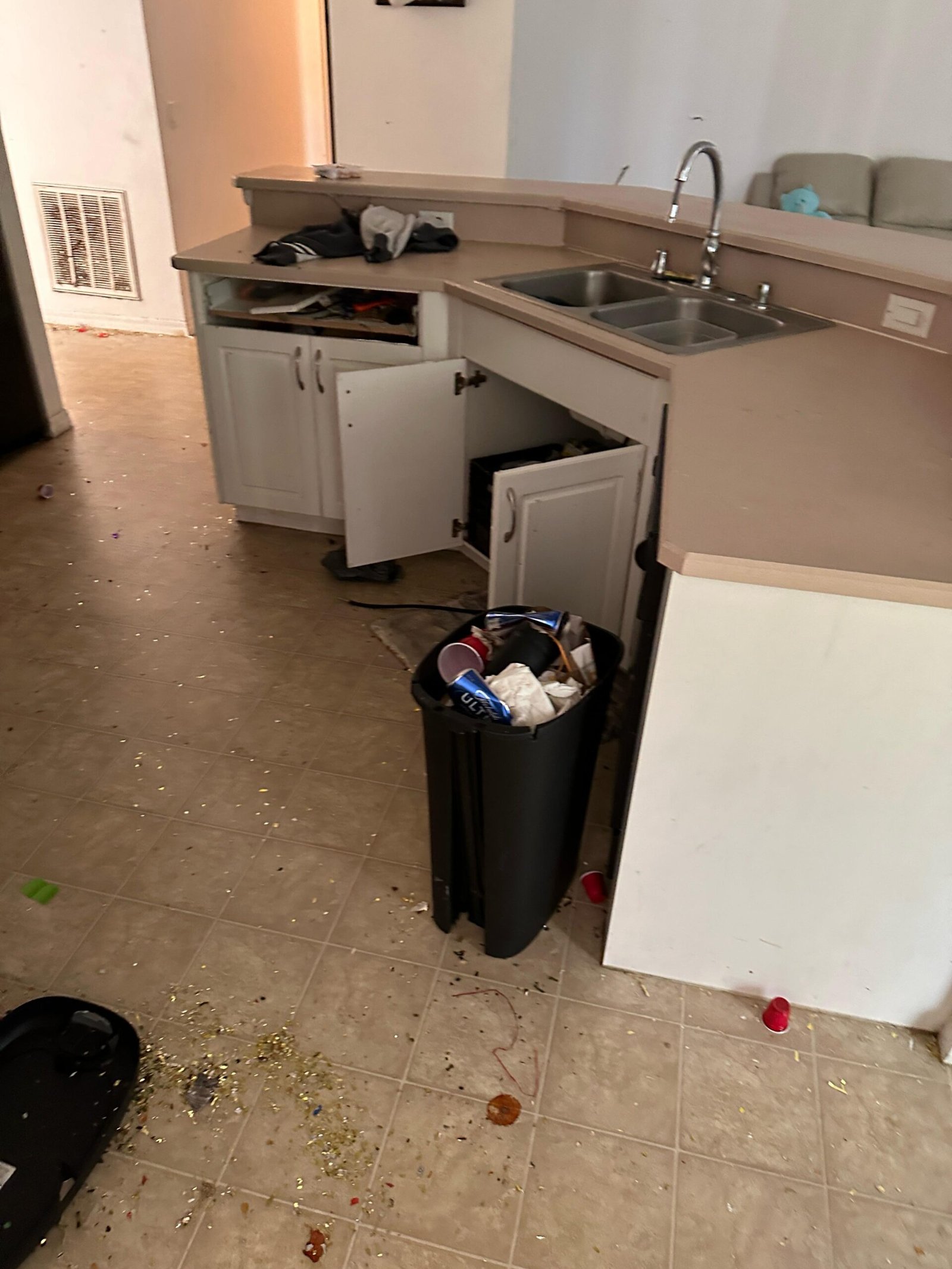 Kitchen appliance removal and cleanout in a Melbourne FL property
