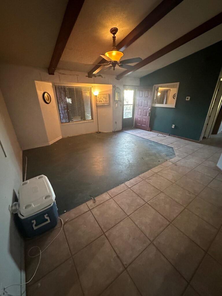 interior living area before whole house junk removal and cleanout in Palm Bay