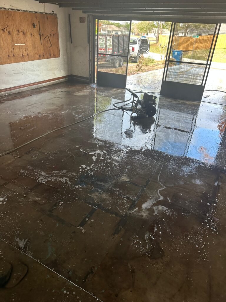 pressure washing and surface cleaning during property cleanup in Palm Bay FL