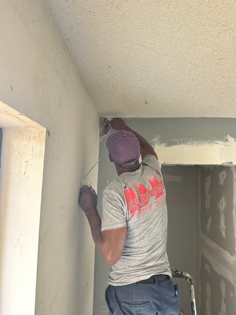 drywall repair and wall patching during property cleanout in Palm Bay FL