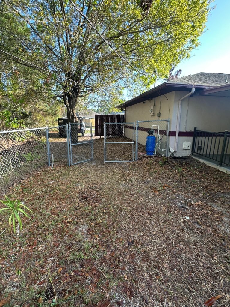 Palm Bay FL tenant eviction cleanout side yard cleared of debris
