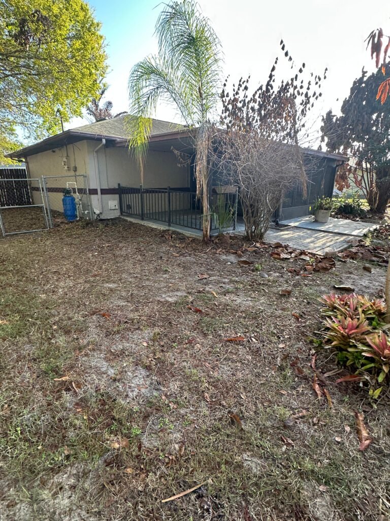 Landscaped backyard exterior after Palm Bay junk removal and demolition