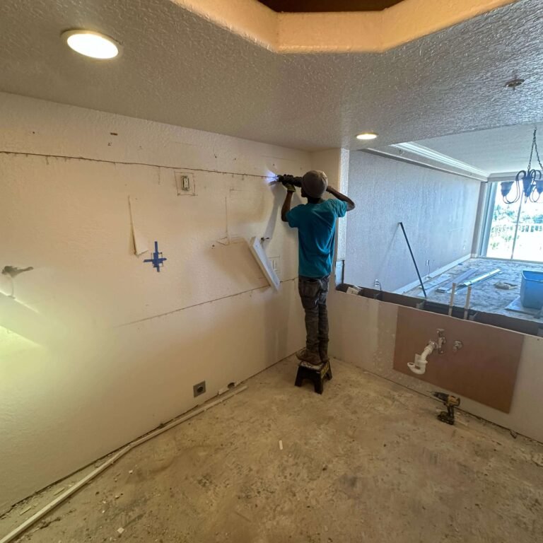 Interior demolition work underway during a Cocoa Beach condo remodel