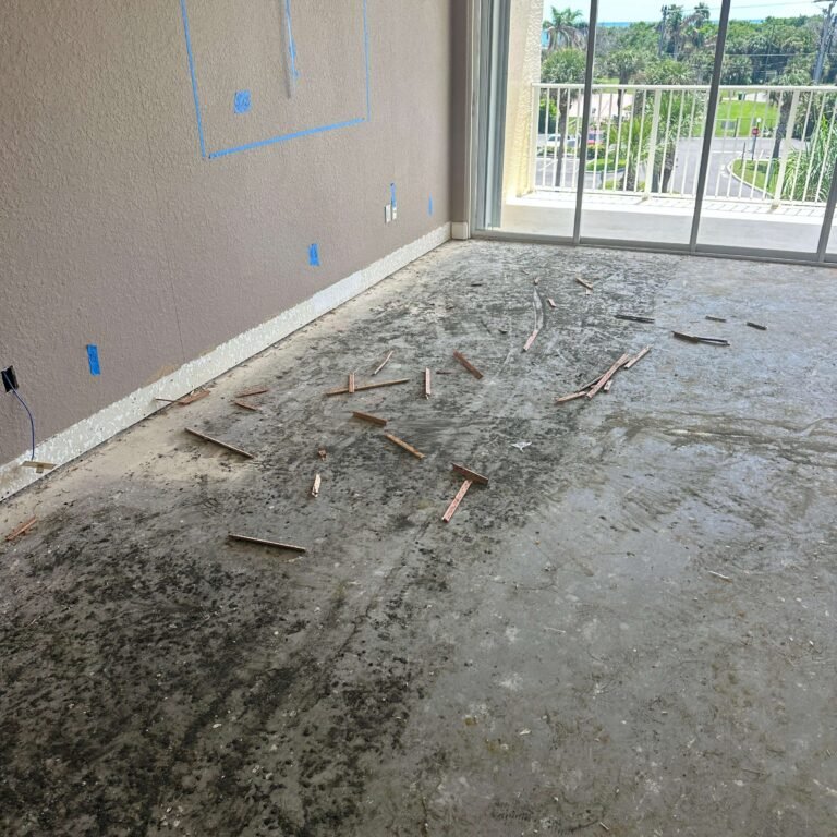 Living room floor after flooring removal during renovation