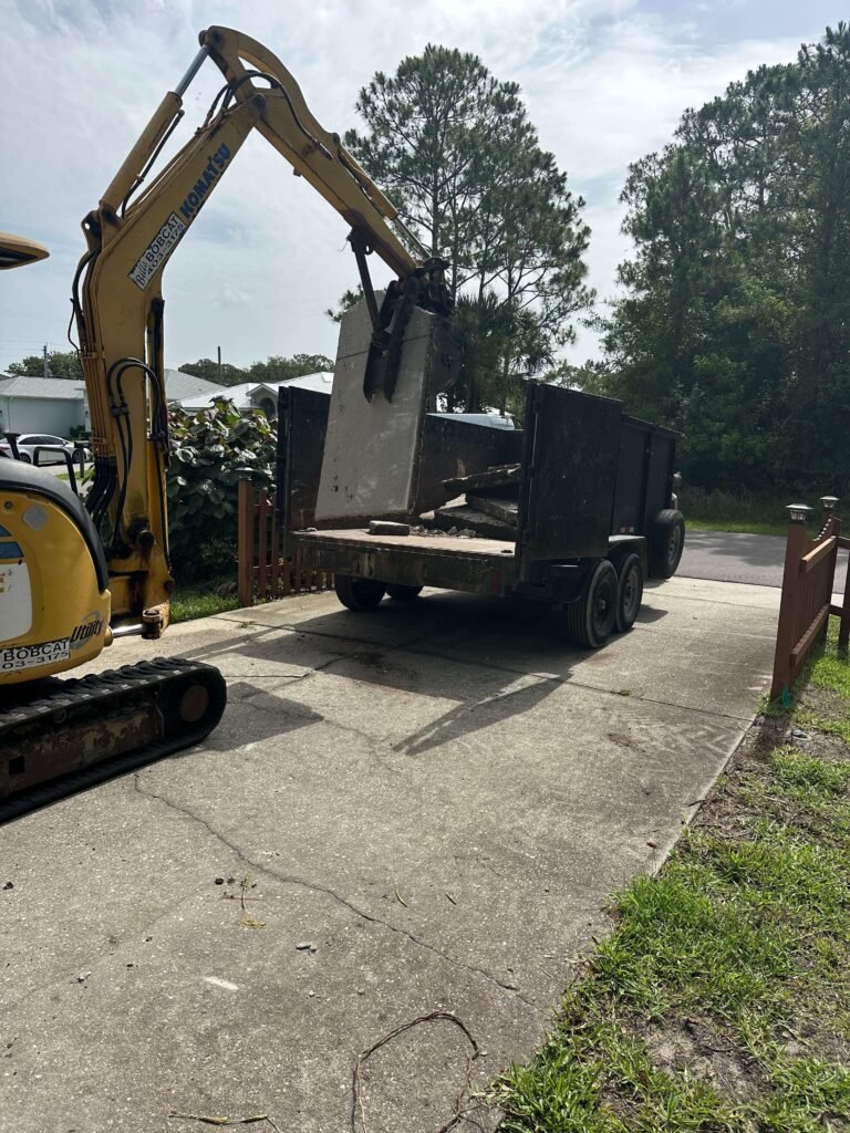 Concrete driveway demolition and debris removal project in Palm Bay, FL